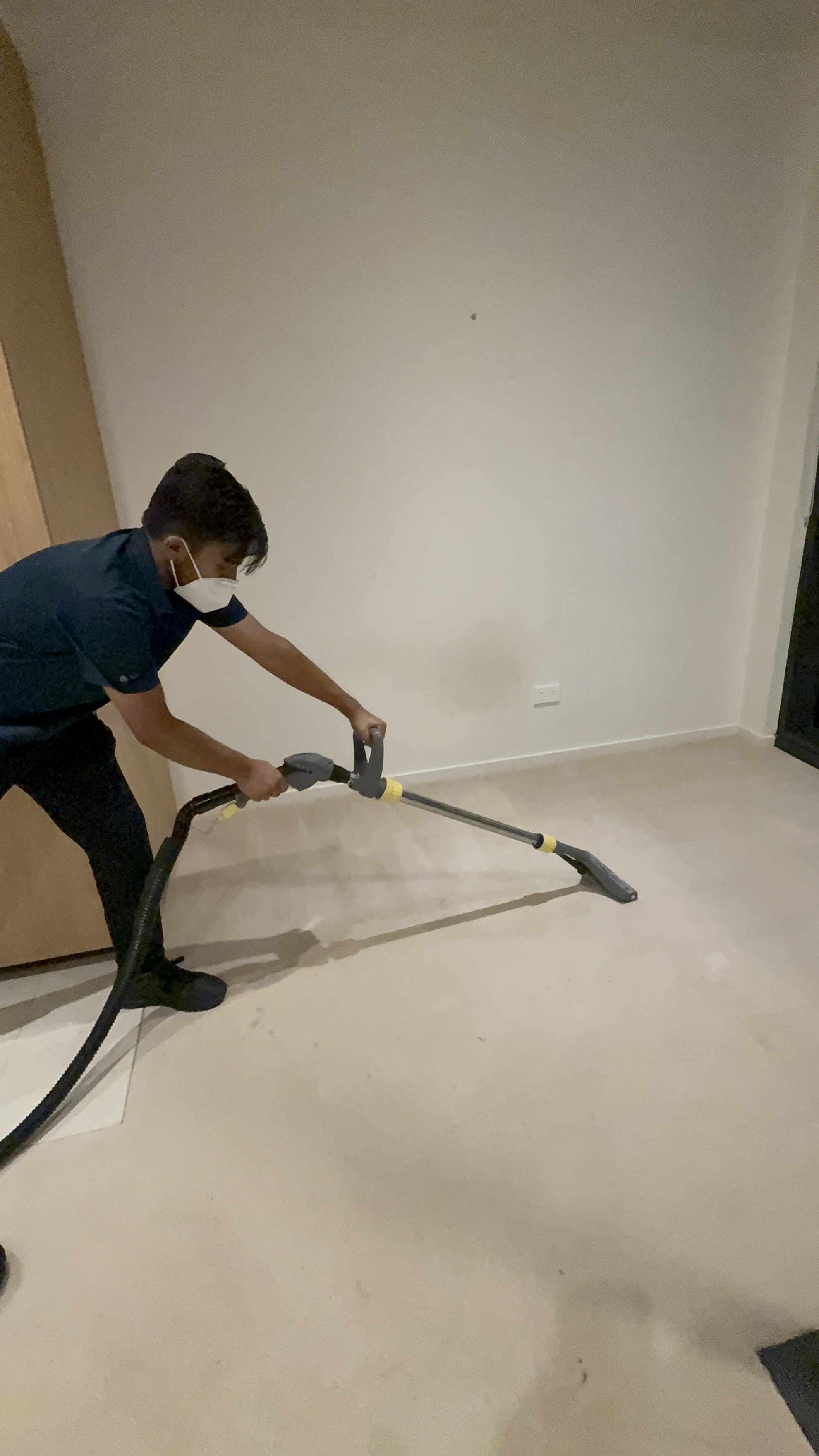 Professional carpet steam cleaning in progress using hot water extraction