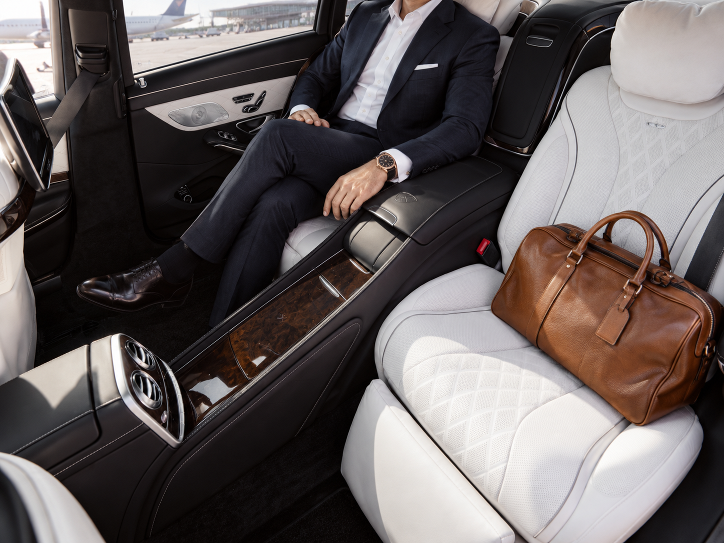 Rear executive seats of a chauffeur-driven limousine