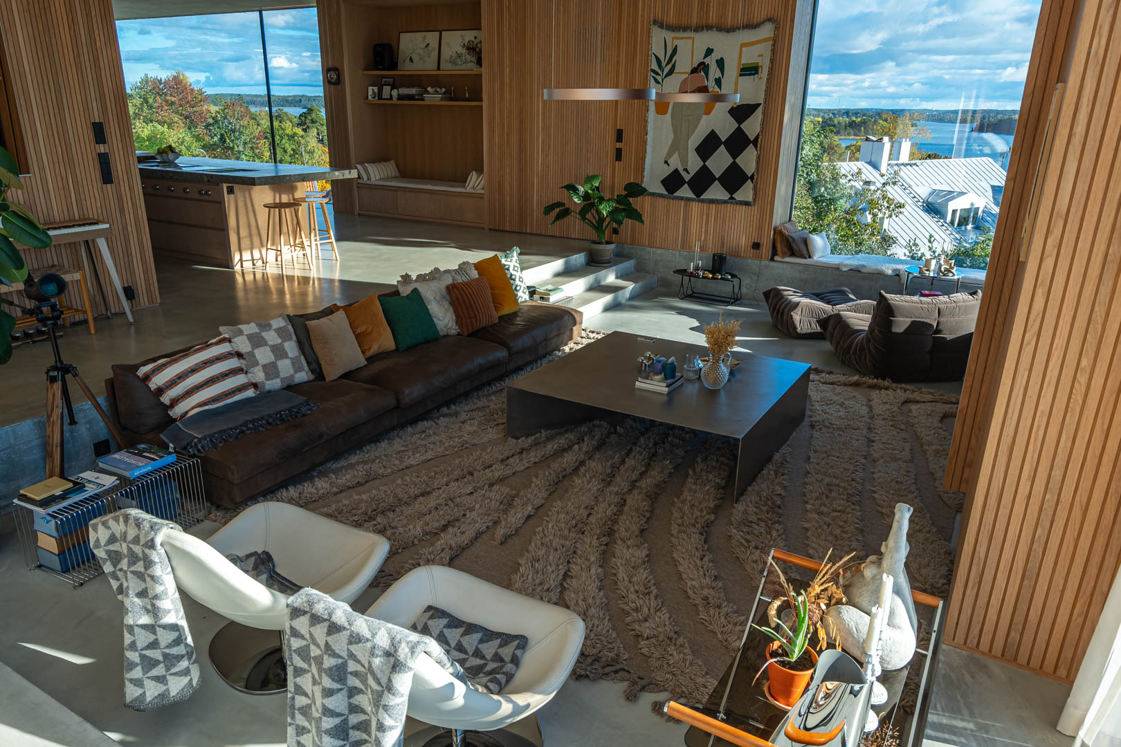 Villa Campbell interior — oak panelling and full-height glazing