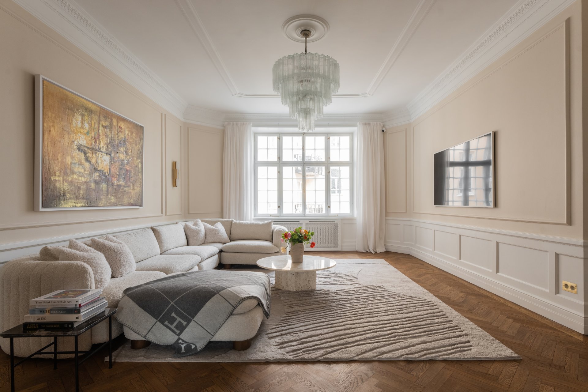 Via Monte entertainment lounge with TV and sectional sofa