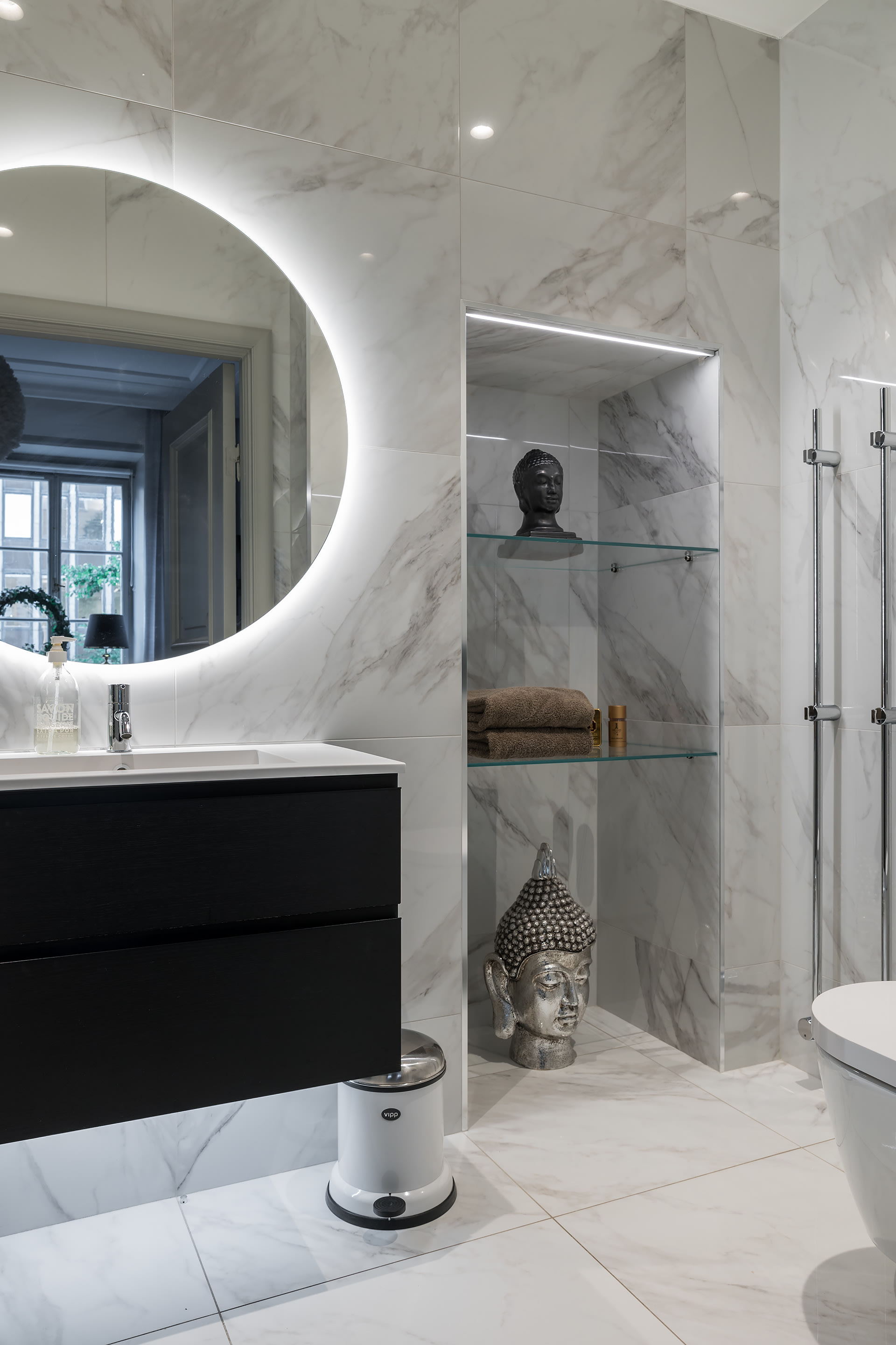 Charles Maison II marble bathroom with rain shower and underfloor heating