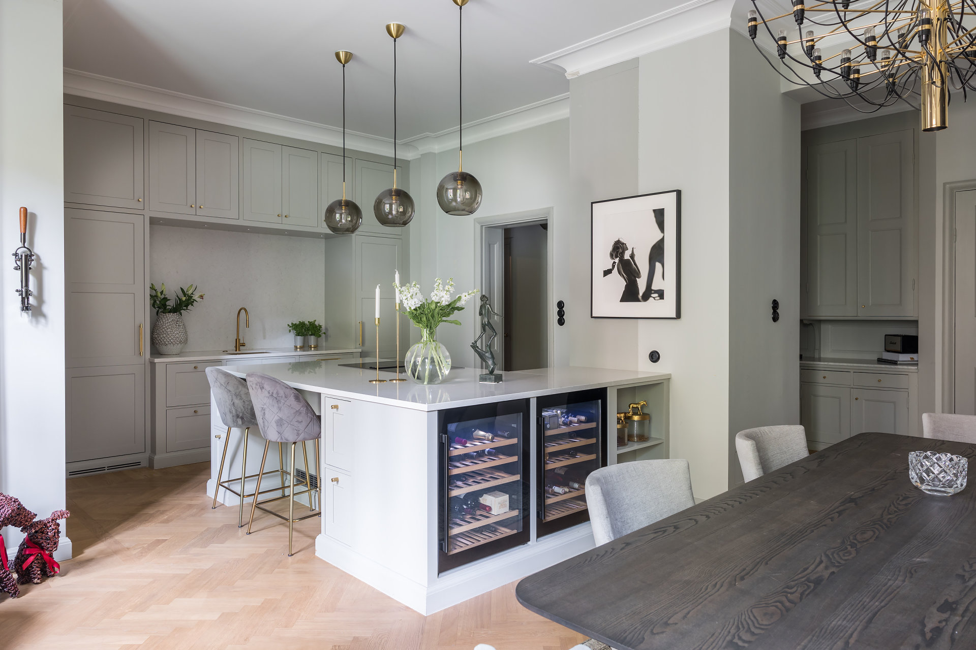 Charles Maison II open-plan kitchen and dining area with island