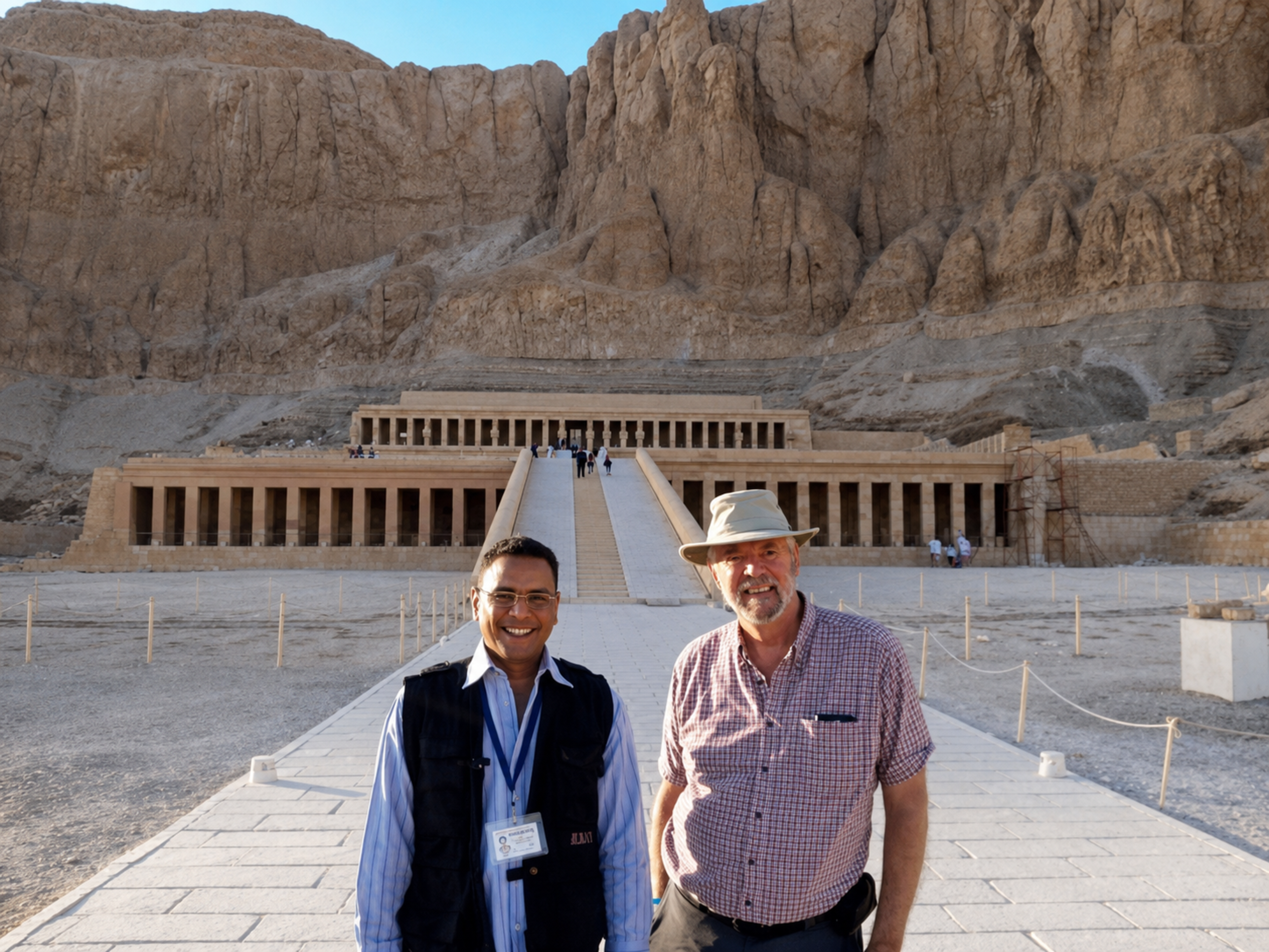 Youssef Hussain, Luxor tour guide, with a guest on the causeway of the Temple of Hatshepsut at Deir el-Bahri.