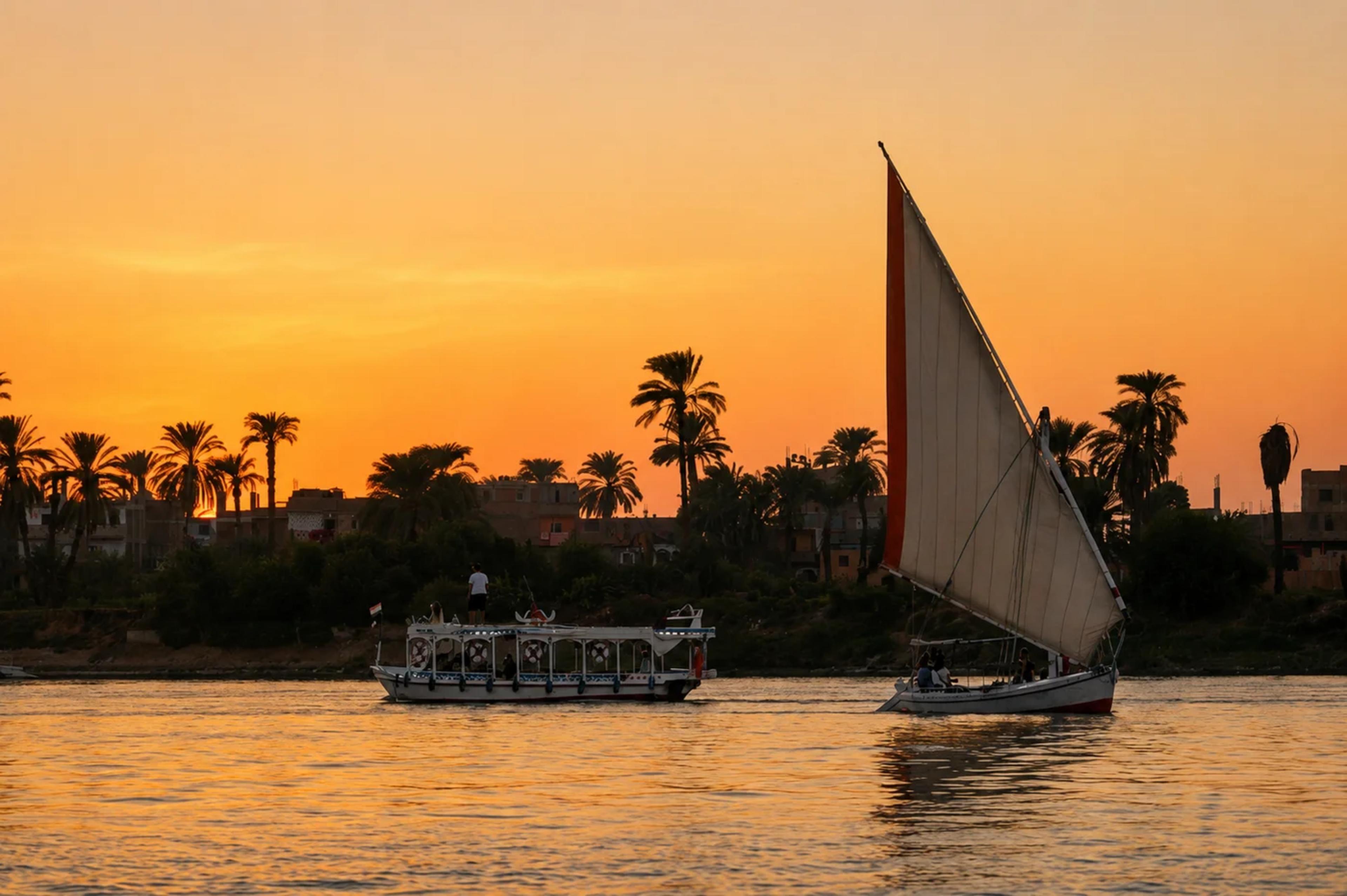 Crossing from the East Bank on the public ferry. The only boats on the Nile at this hour are working boats.