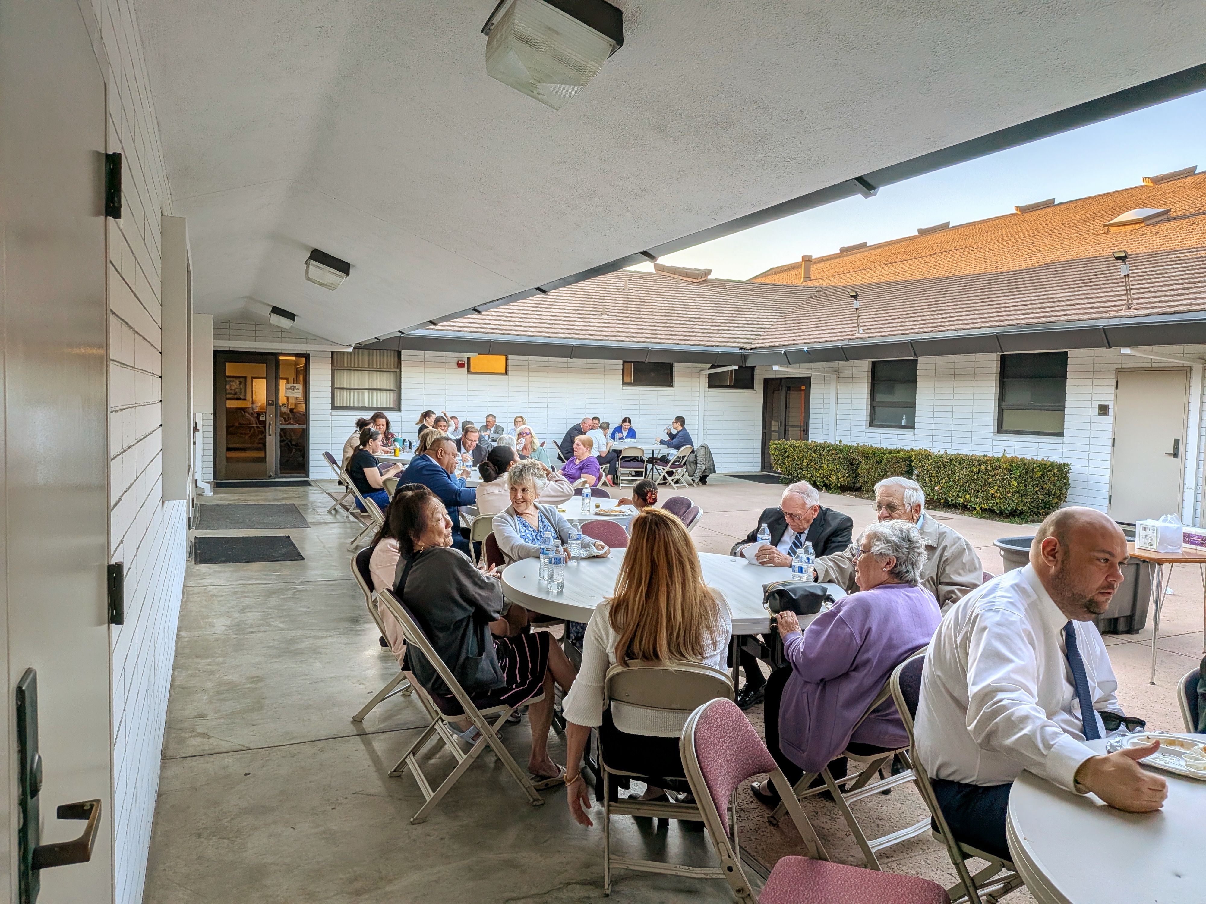Group of community members sharing a meal during Anaheim Stake Conference 2026
