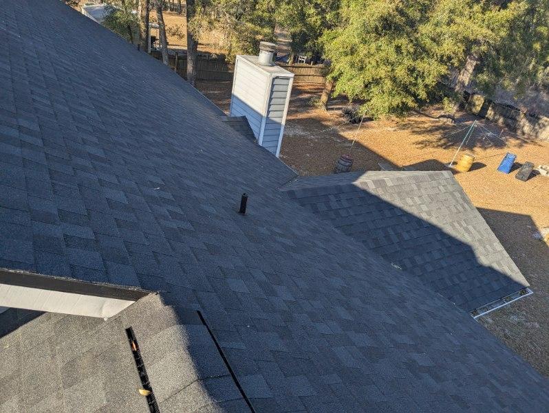 Completed roofing project on a family home