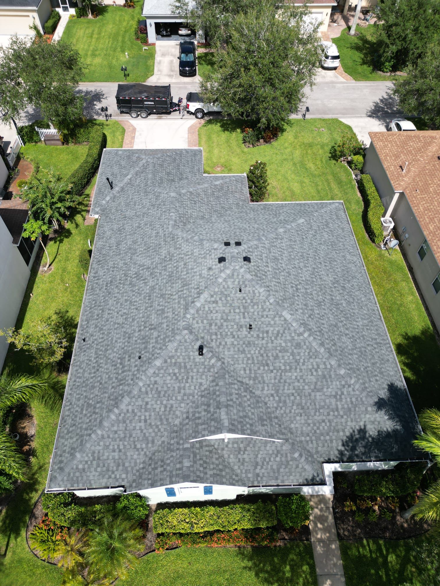 Roofing crew performing a professional roof installation