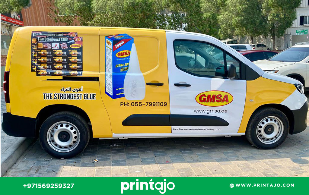Corporate van branding for GMSA (Global Marine Services & Alliances) in Dubai, featuring a professional navy and white vinyl wrap with maritime logistics icons, installed by Printajo.