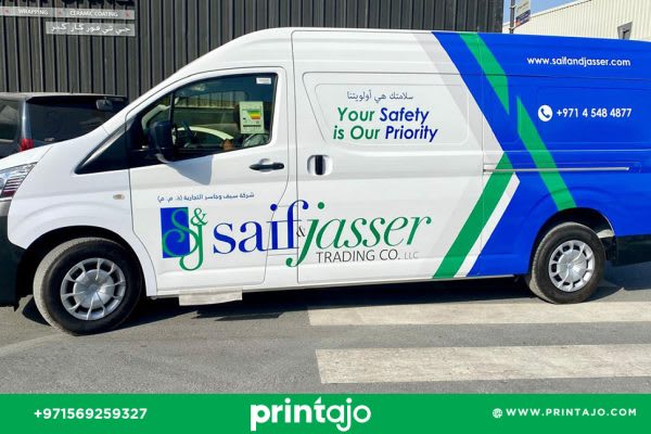 Saif and Jasser branded van with custom vehicle wrap in Dubai by Printajo featuring company names and graphics