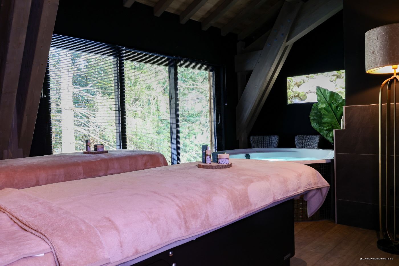 A treatment room at the FORêT spa, opening onto the mountain