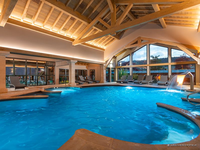 The indoor pool at the Grand Hôtel, under its wooden beams