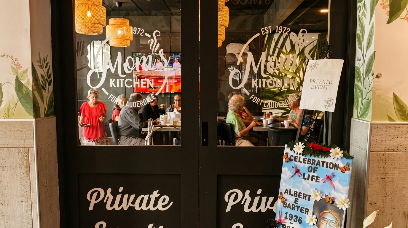 Restaurant patrons seated at tables inside Mom's Kitchen, viewed through glass doors with a "Private Event" sign.