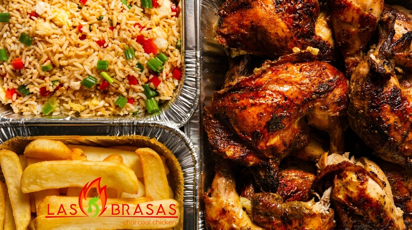 Las Brasas charcoal chicken, fried rice, and fries in foil containers.
