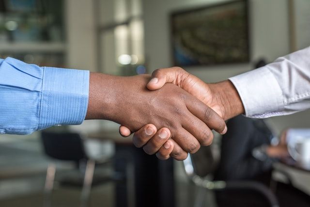 shaking_hands_partner_Photo by Cytonn Photography on Unsplash 