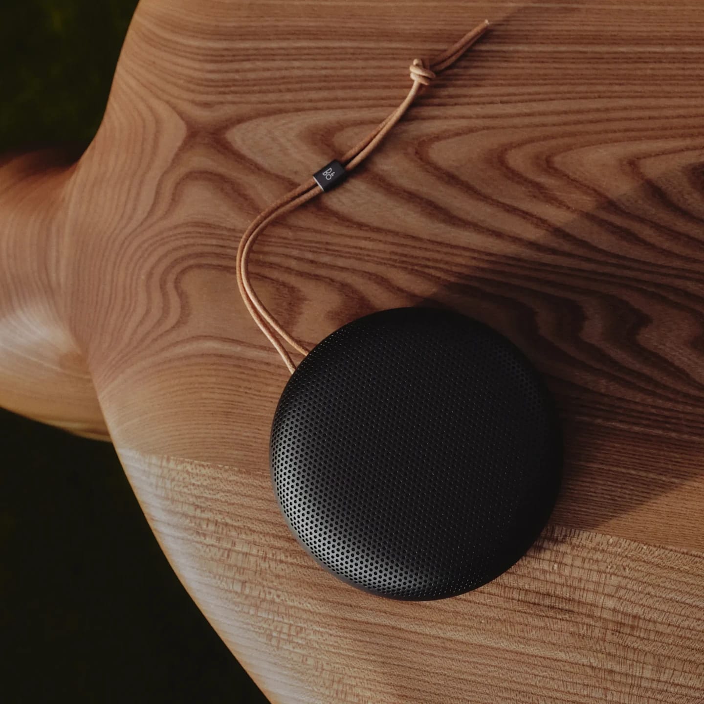 Studio Line A1 warm granite on a wooden table