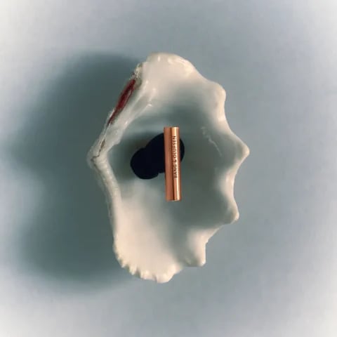 Left side of Super Hoodie in a seashell