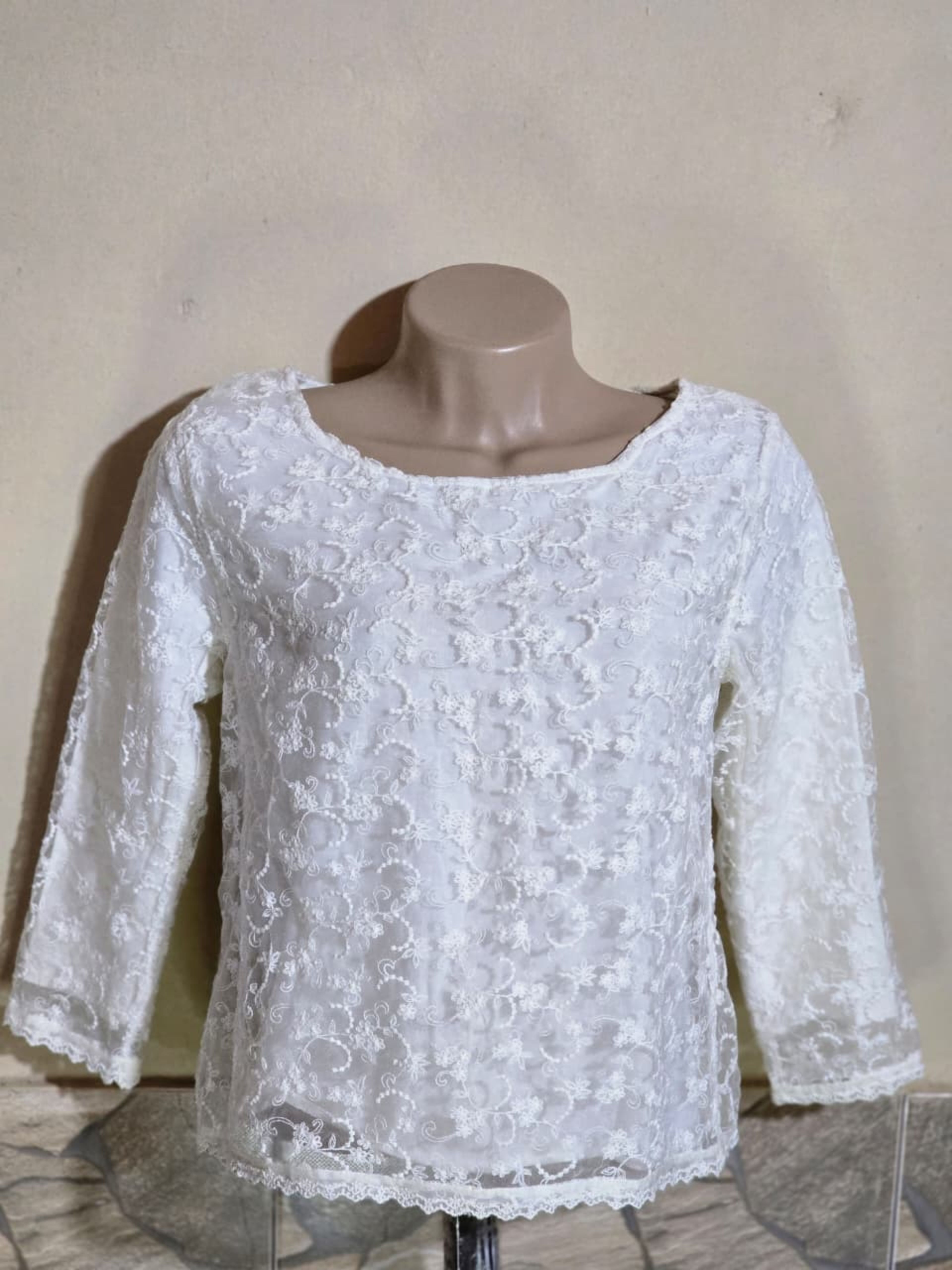 Blusa elegante.