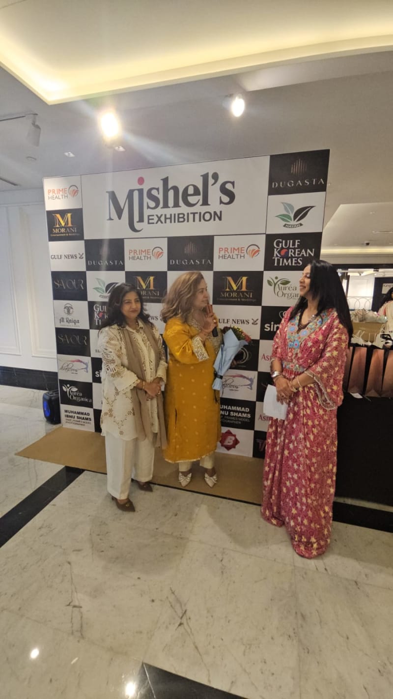 Mishel's Exhibition branded event backdrop