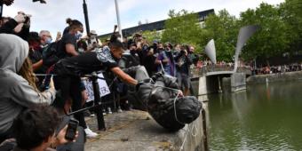 Boris Johnson claims Black Lives Matters protests ‘subverted by thuggery’ as Tories hit out at removal of slave trader statue