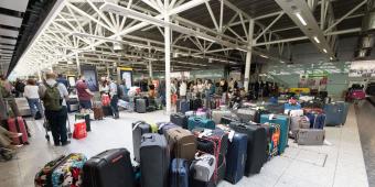 Transport Secretary Is 'Very Concerned' About Airport Delays Ahead Of Peak Summer Travel