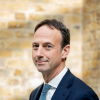 Sir Alex Chisholm, UK Chairman
