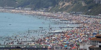 Boris Johnson warns of ‘serious spike’ in coronavirus if people ‘take liberties’ with social distancing after huge crowds flock to beaches