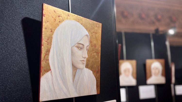 Refugee Week marked in Parliament with exhibition featuring portraits of refugee women