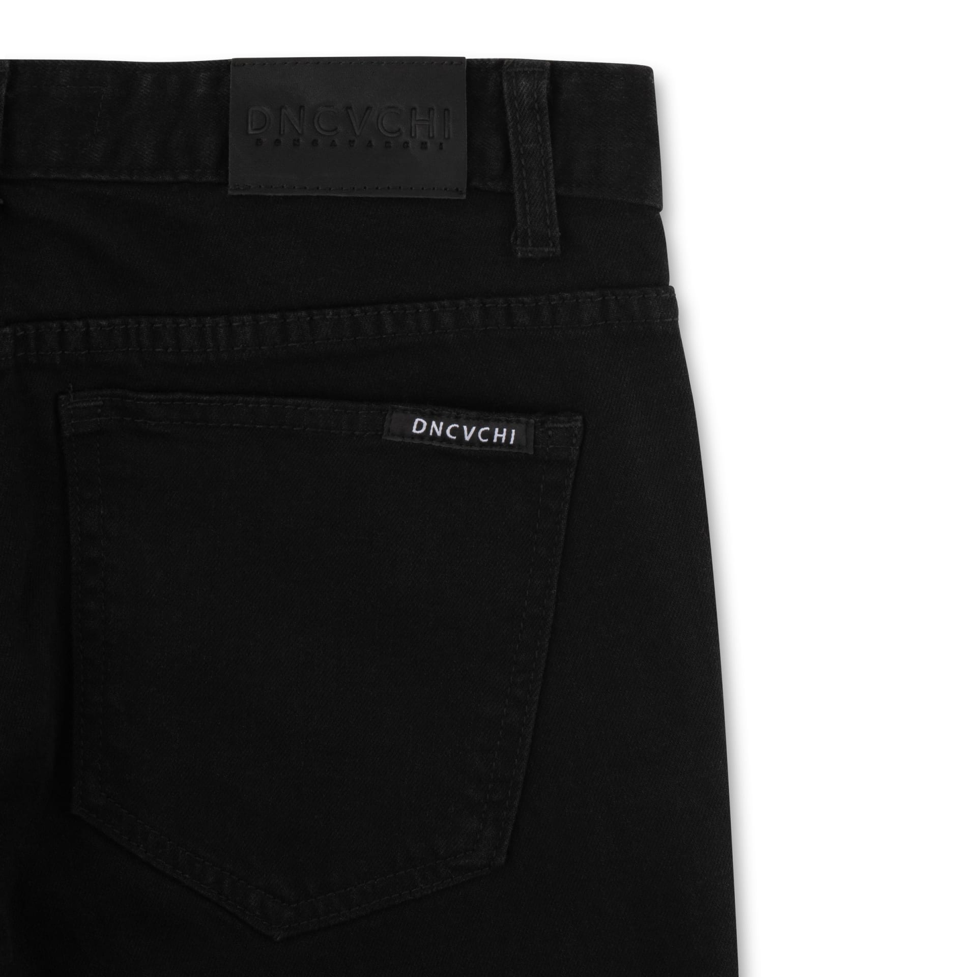 Black denim jeans back pocket detail packshot - clothing product photography UK