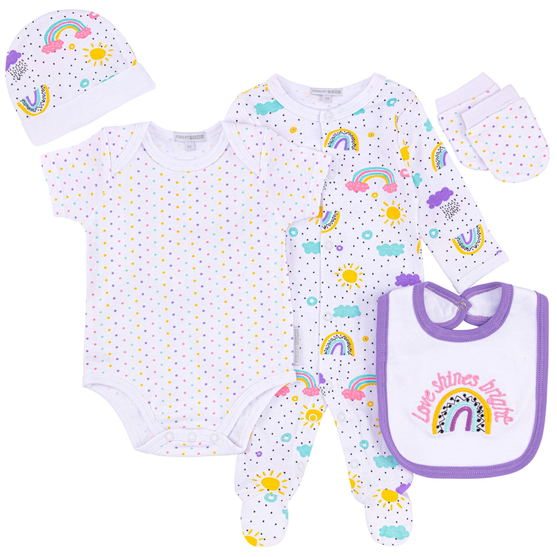 Coordinated rainbow-print baby clothing and accessories photographed together