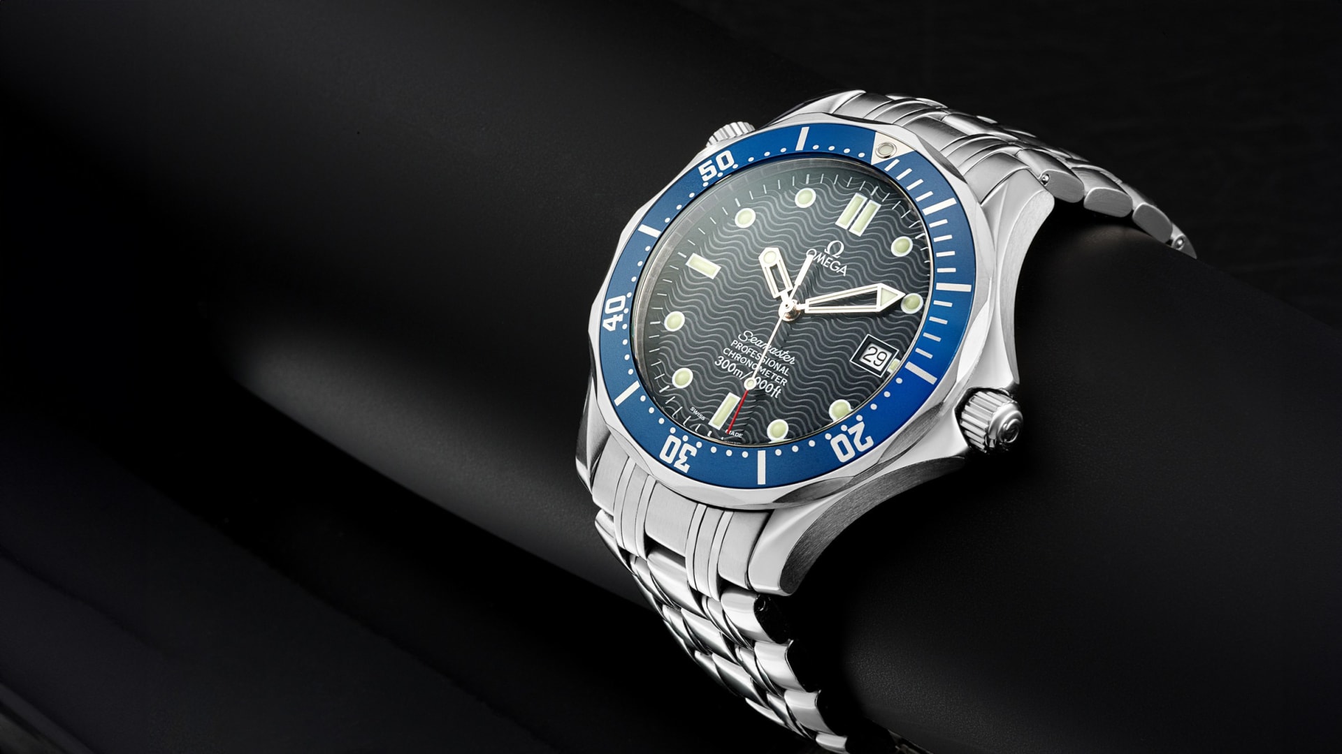 Omega Seamaster luxury watch blue bezel studio angle - watch product photography UK