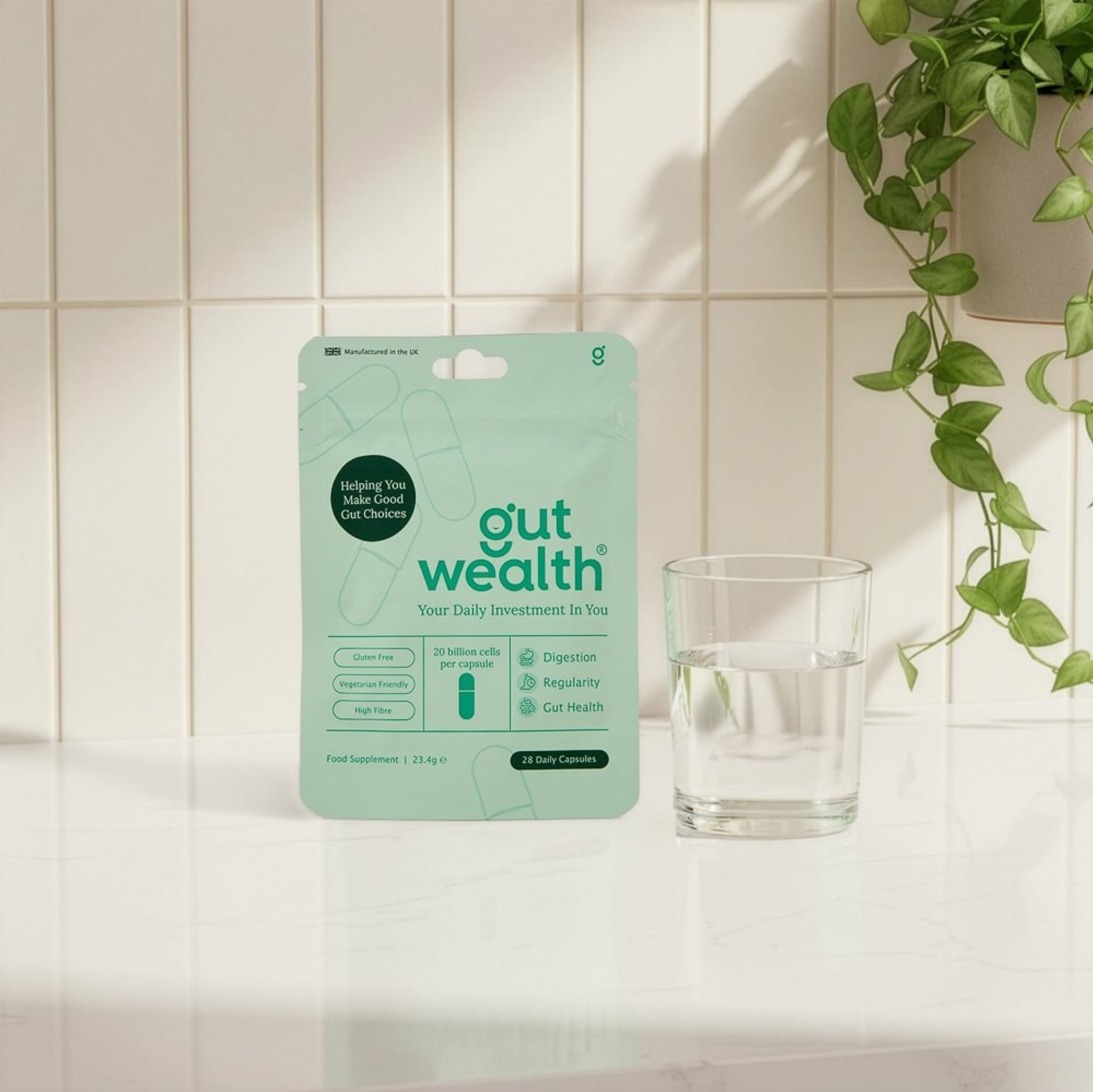 Gut health supplement pouch in mint green lifestyle setting