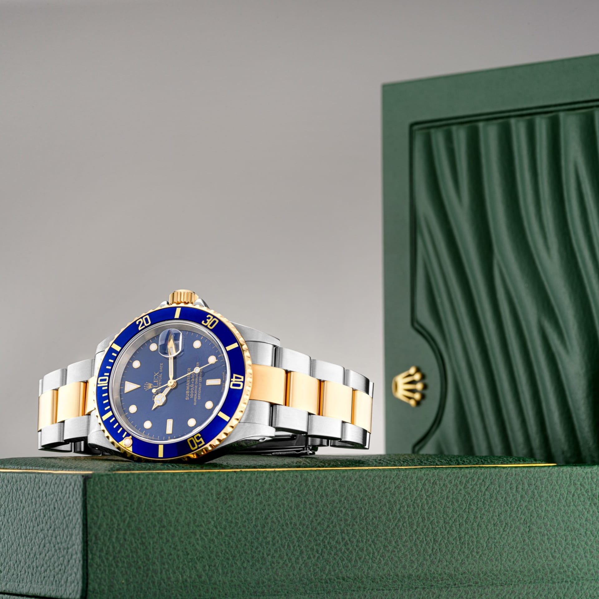 Luxury two-tone dive watch blue dial lifestyle - watch product photography UK