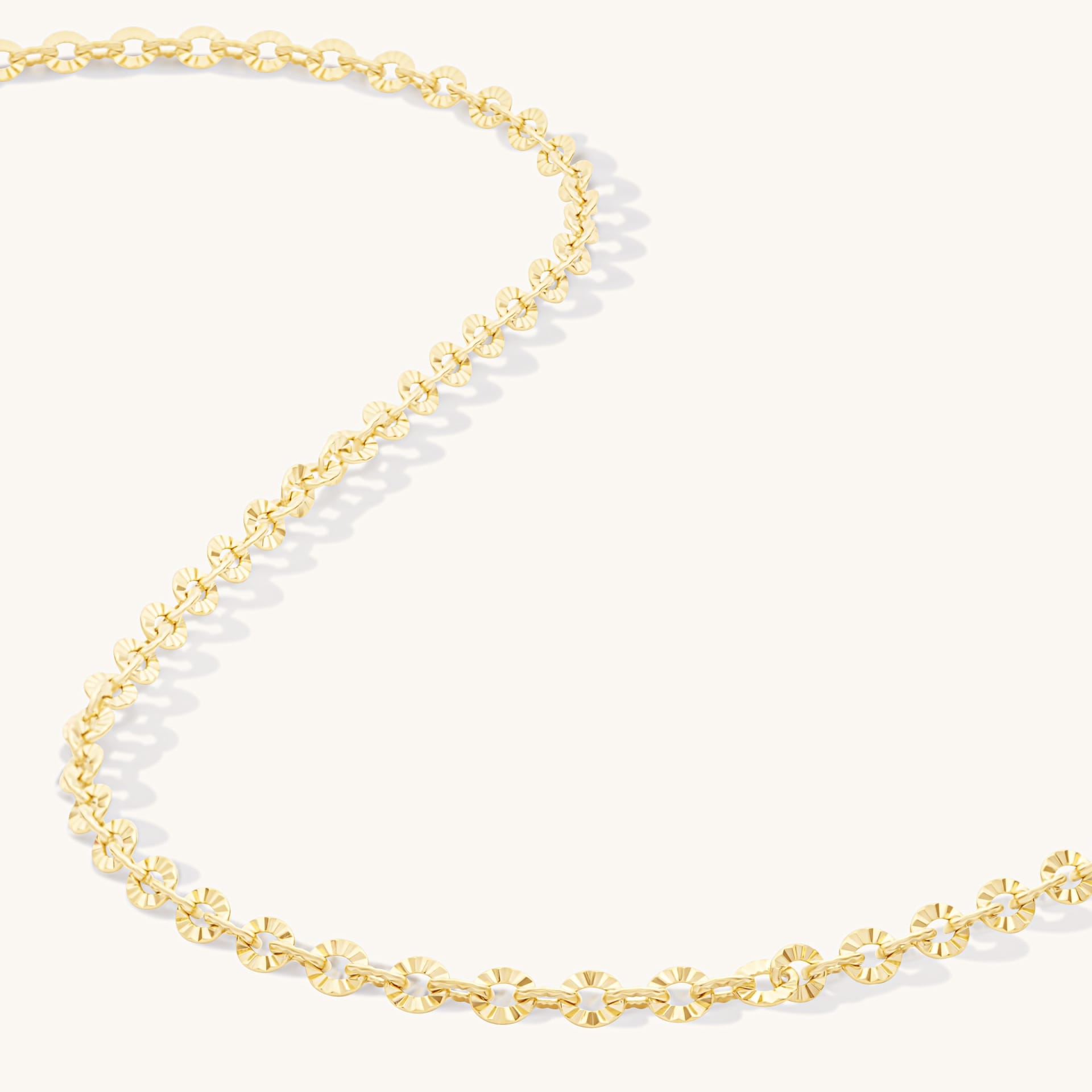 Gold chain necklace textured links detail - macro jewellery craftsmanship photography UK