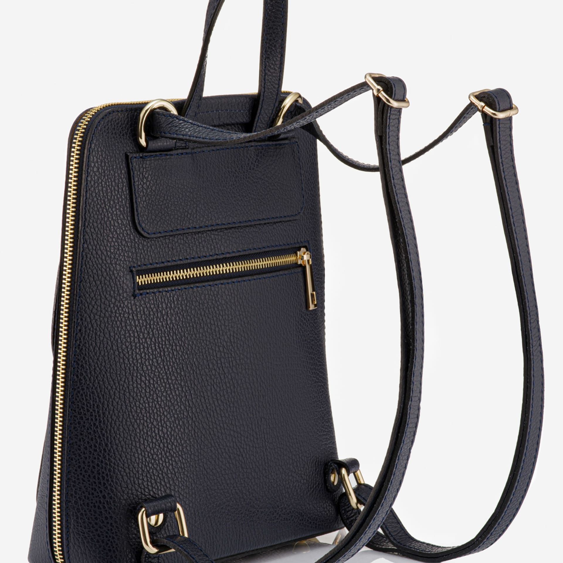 Navy leather mini backpack with gold hardware packshot - bag product photography UK
