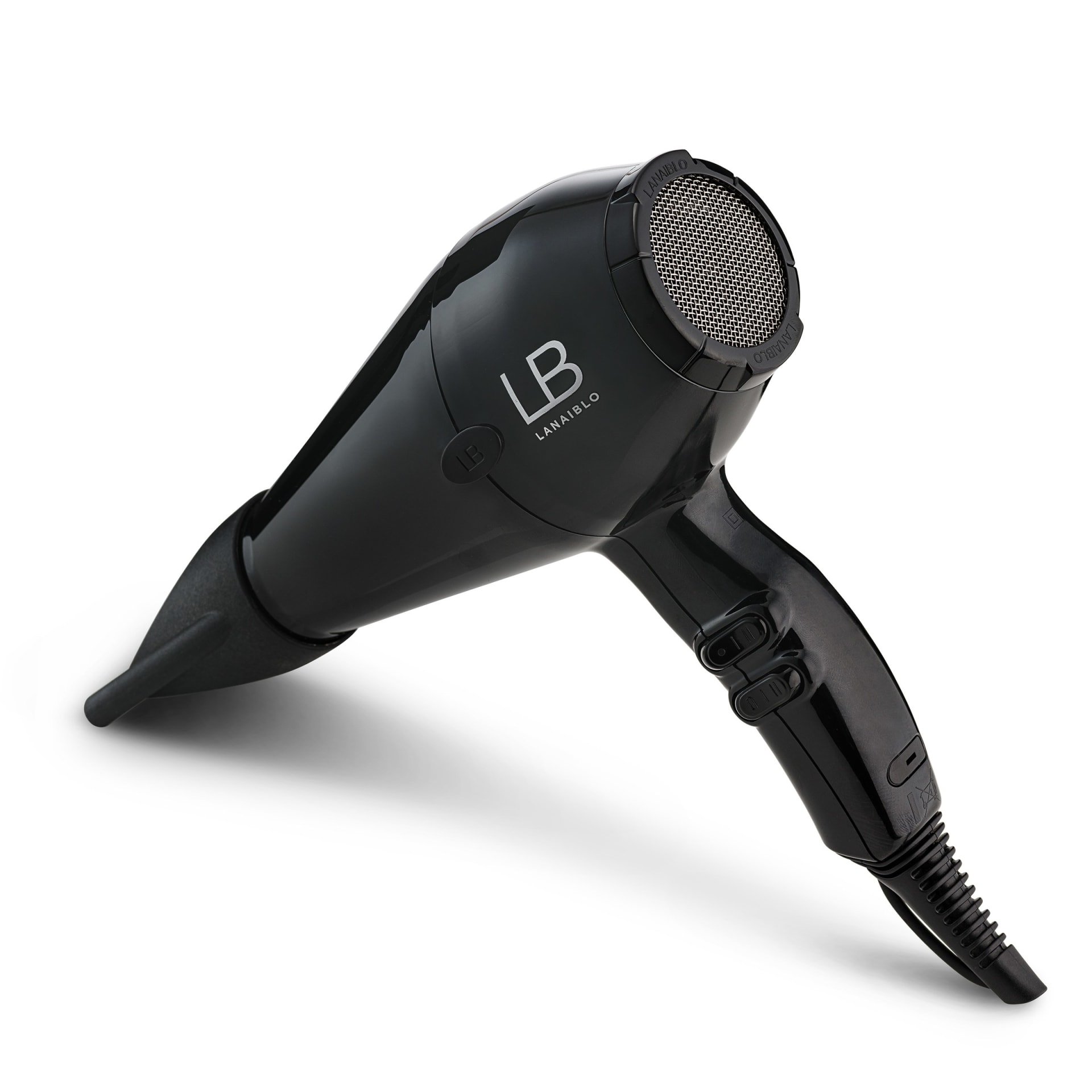 Black professional hair dryer packshot on white background - beauty product photography UK