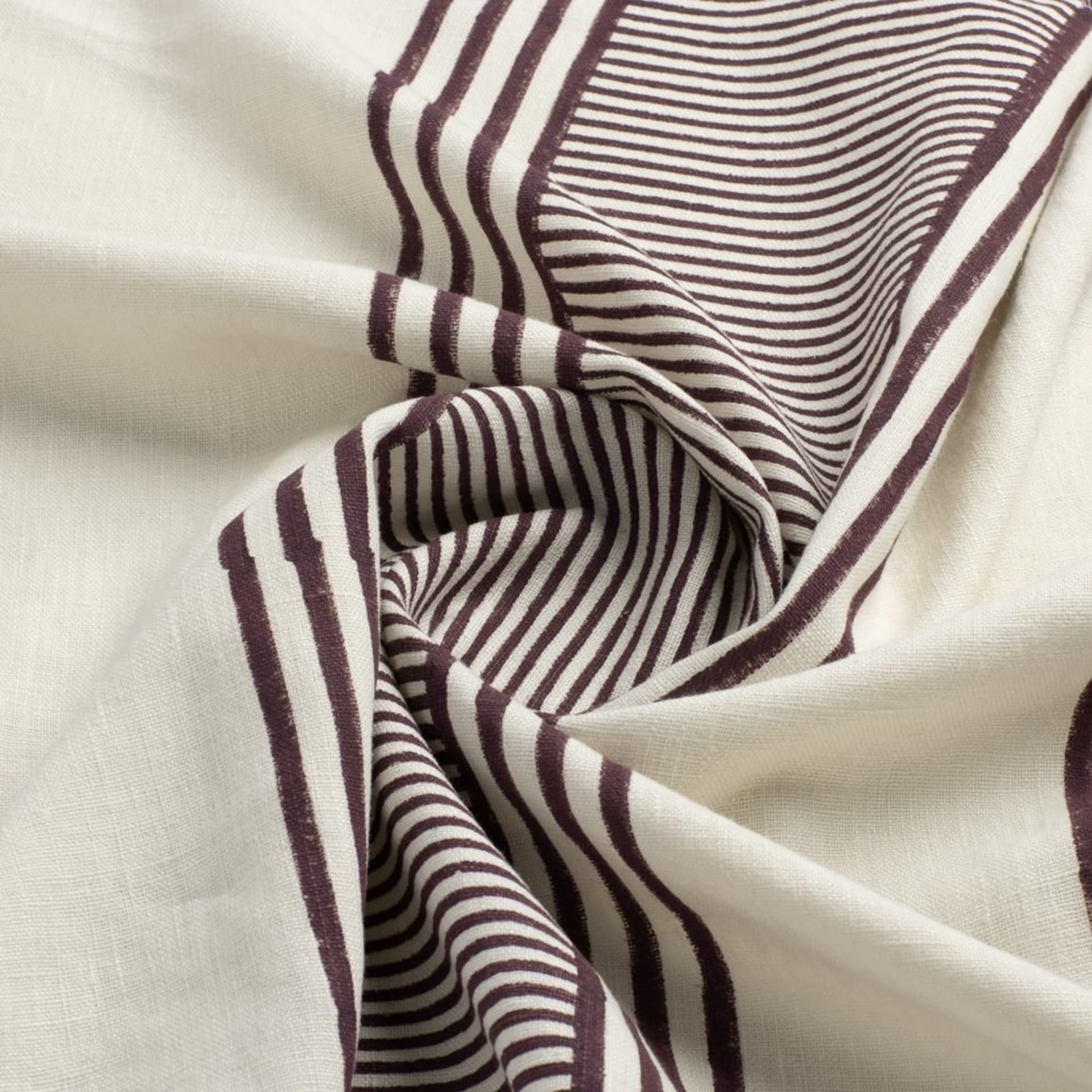 Cream and plum striped linen fabric draped - fabric swatch photography UK