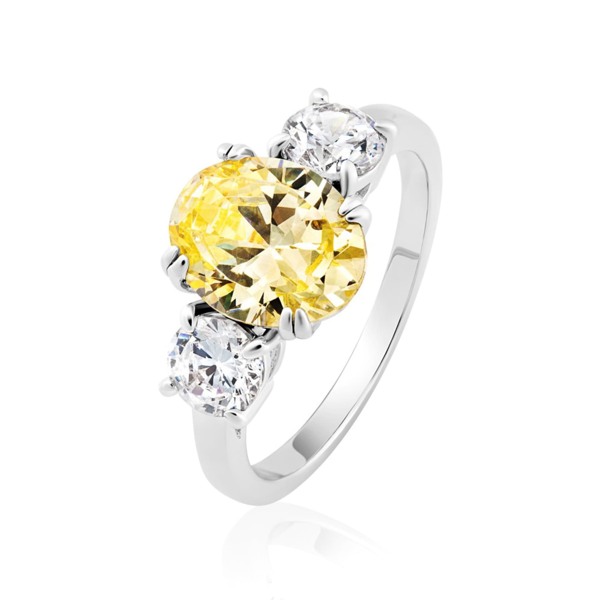 Yellow diamond trilogy ring in white gold setting - coloured gemstone jewellery photography UK
