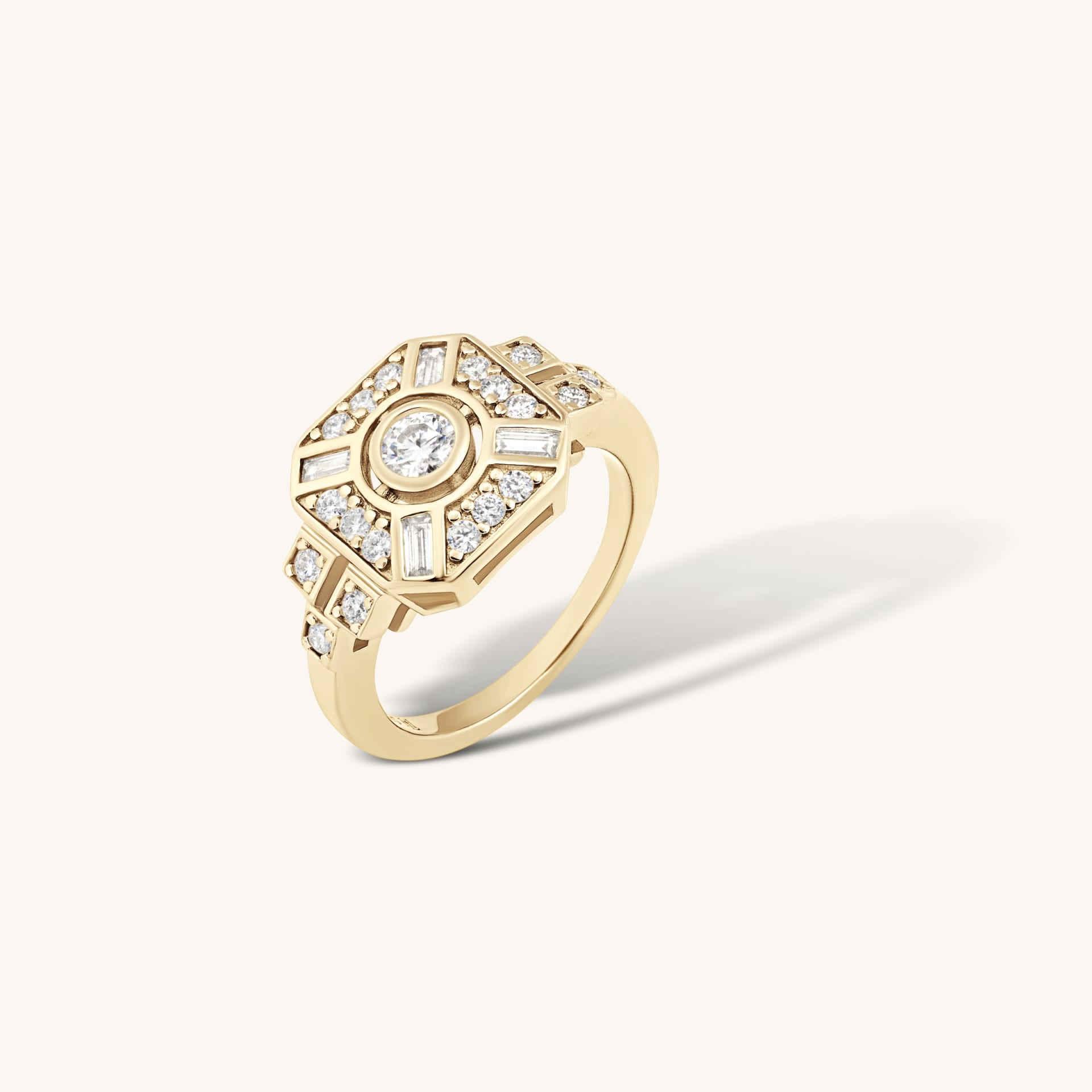 Art Deco gold and diamond ring on cream background - vintage jewellery photography UK