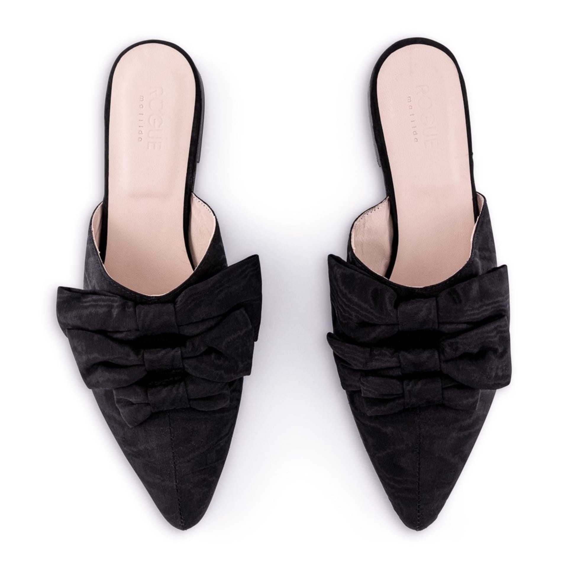 Black bow mule shoes flat lay on white background - footwear product photography UK