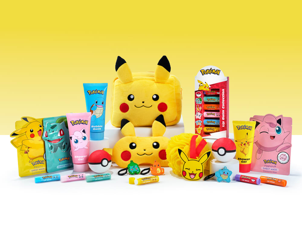 H&A Pokémon bath and body product range with Pikachu, colourful packaging and accessories on a yellow studio set