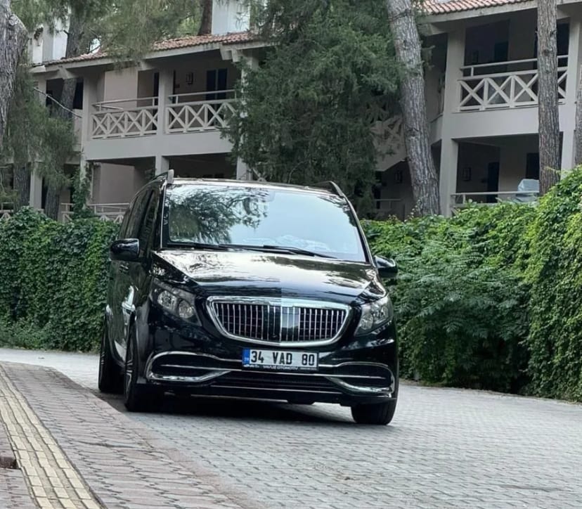 Black Mercedes Vito VIP van on a hotel drive