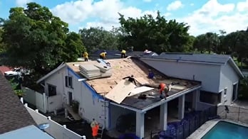 Lionz Roofing crew in Dania Beach