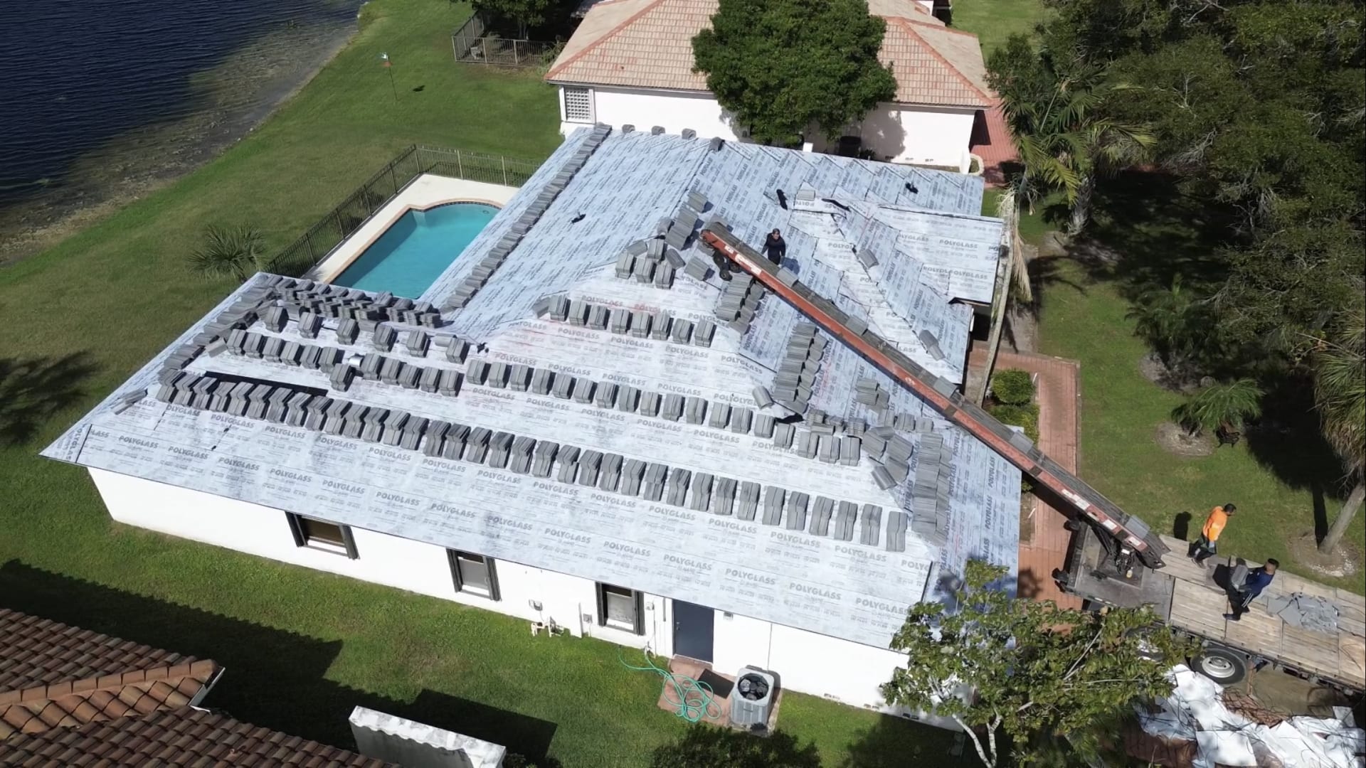 Lionz Roofing crew in Lake Worth Beach