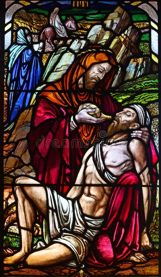Stained glass window depicting the Good Samaritan