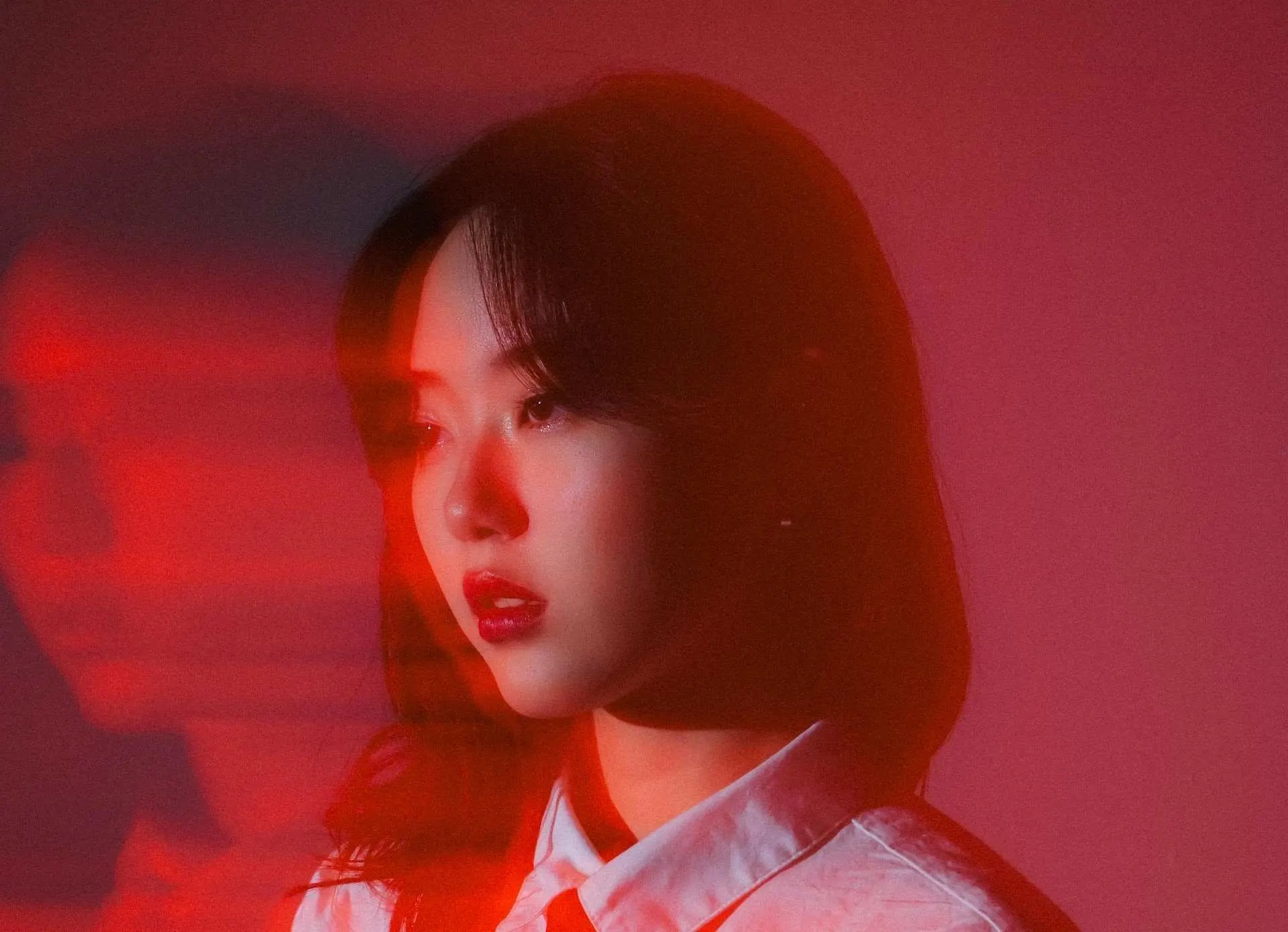 Young woman in red light