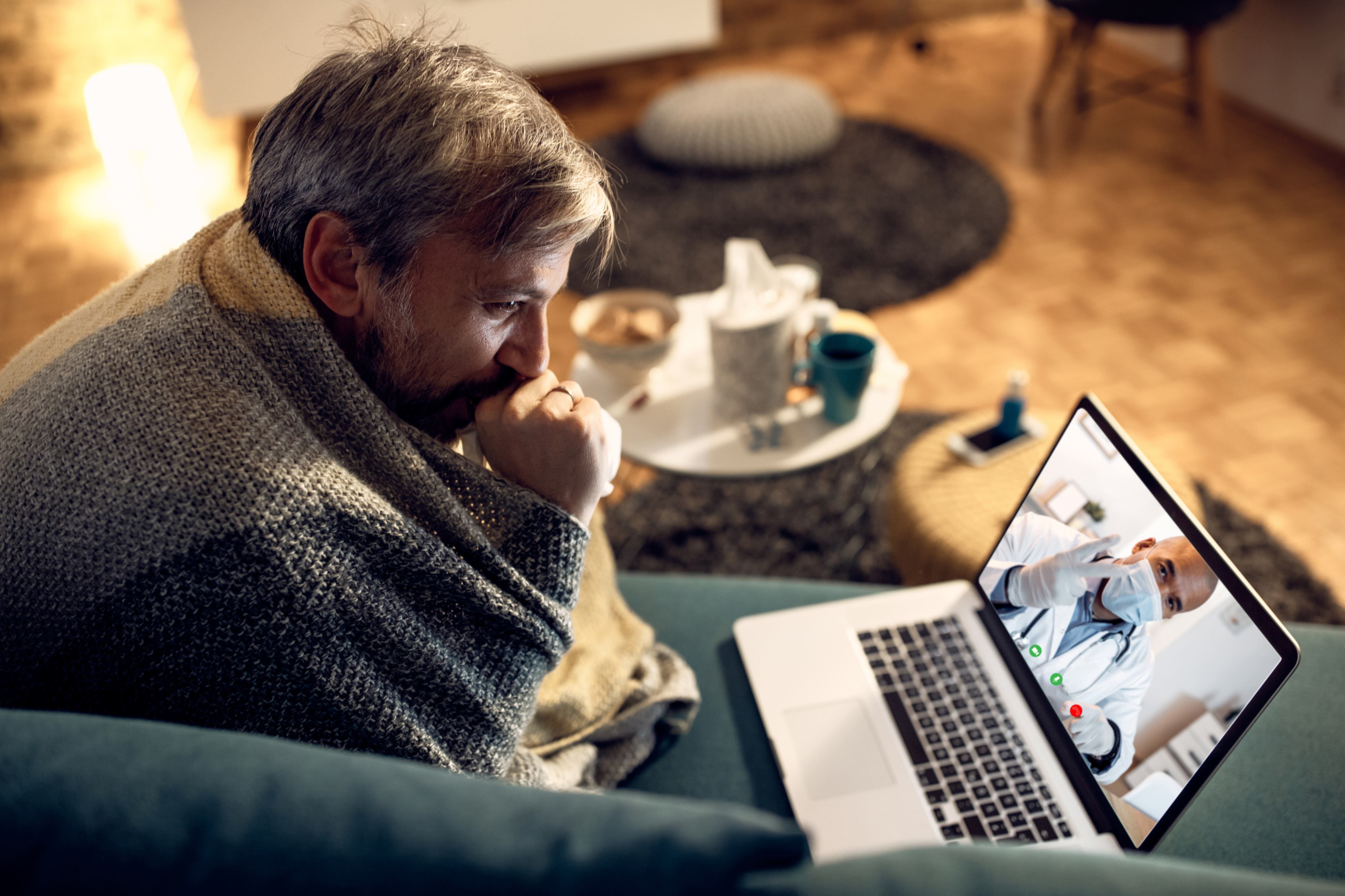 A man in online therapy session