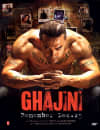 Poster for the film Ghajini, featuring a muscular man surrounded by photos, illustrating themes of memory and mental health.