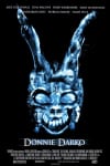 Donnie Darko movie poster featuring a shadowy rabbit figure, exploring themes of mental illness and existential crisis.