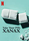 White pills with the text Take Your Pills XANAX on a turquoise background, highlighting themes of mental health and medication.