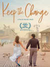 Couple walking hand in hand along a shoreline, evoking themes of connection and personal experiences in the film Keep the Change.